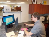 Niko Levy working at desk